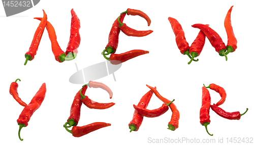 Image of New year text composed of red chili peppers