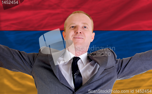 Image of happy businessman because of profitable investment in armenia