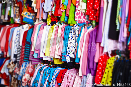 Image of Baby clothes hangers in a store