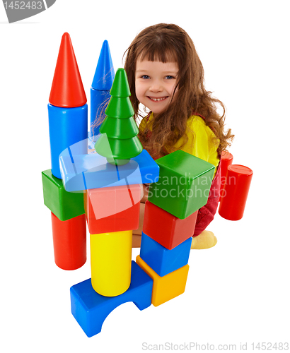 Image of Child built a castle from color cubes