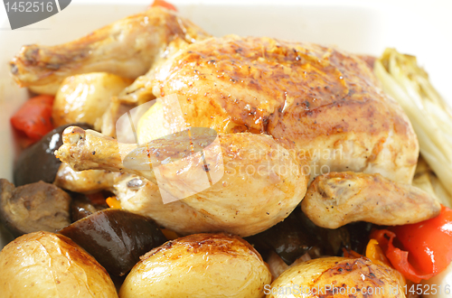 Image of Chicken and roast vegetables side view