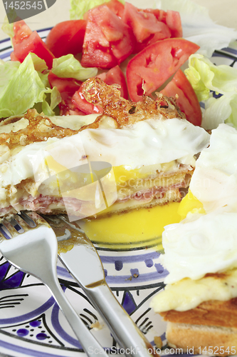 Image of croque madame vertical with salad