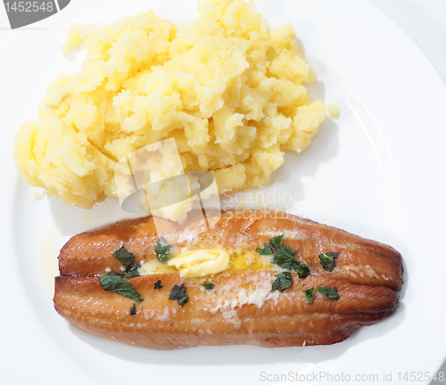 Image of Grilled kipper and potato from above