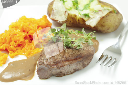 Image of Filet mignon meal with fork