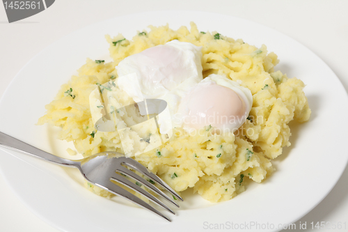 Image of Poached eggs and potato