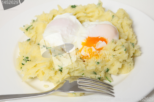 Image of Poached eggs and potato