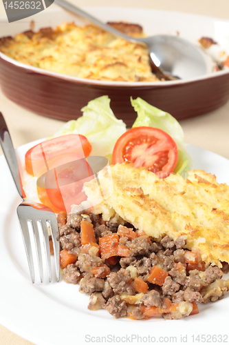 Image of Shepherds pie with serving dish vertical