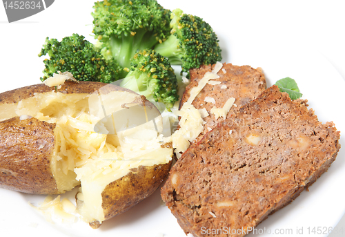 Image of meatloaf baked potato broccoli and cheese