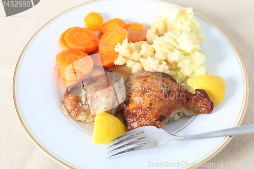 Image of Lemon chicken meal on plate