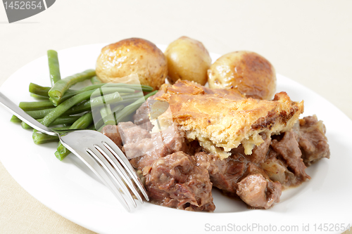 Image of Steak and kidney pie with fork