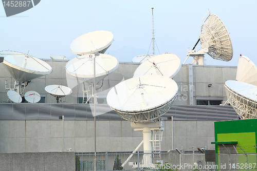 Image of Satellite Communications Dishes on top of TV Station 