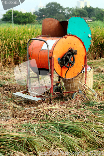 Image of Vintage rice wood machine 