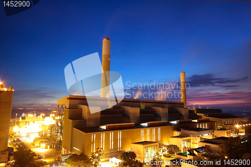 Image of coal power station and night blue sky 