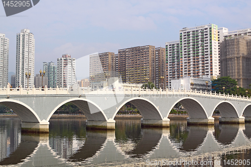 Image of Arch bridge in asia downtown area, hong kong