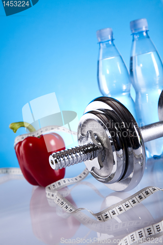 Image of Dumbbell and bottle water