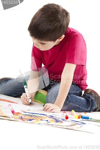 Image of the boy drawing 
