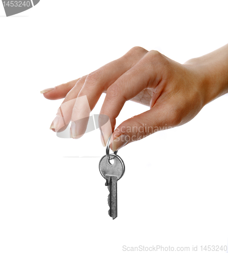 Image of Womans hand holding a key