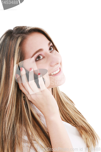 Image of Beautiful woman talking on her cell phone 