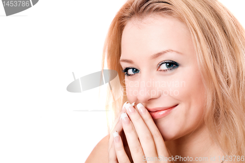 Image of Closeup portrait of a smiling young blonde