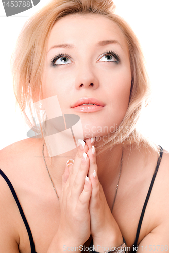 Image of Portrait of a praying young woman