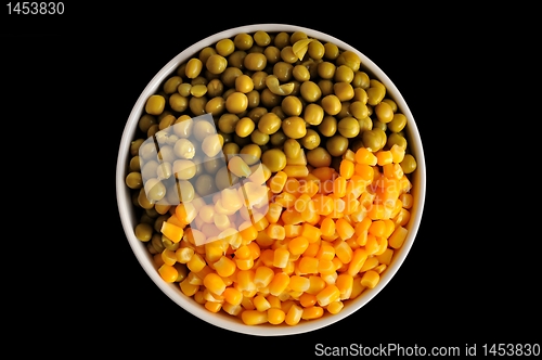 Image of corn and peas on black