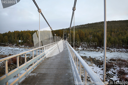 Image of Pedestrian bridge over the river