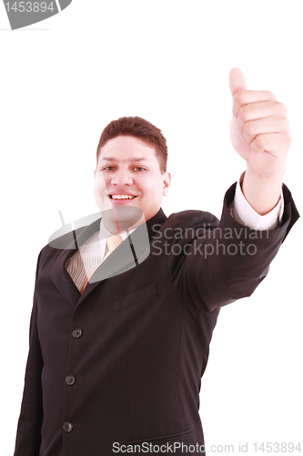Image of young business man going thumb up, isolated on white 