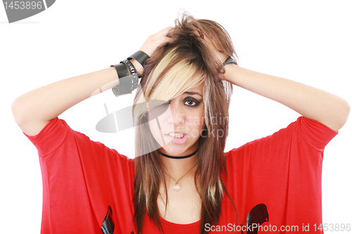 Image of Young punk woman in desperation gesture 