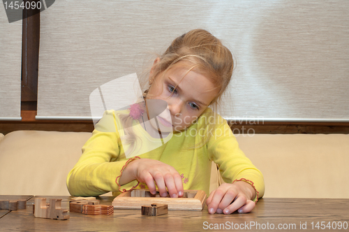 Image of Girl with conundrum.