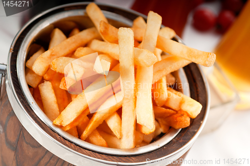 Image of fresh french fries on a bucket