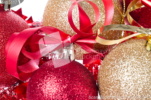 Image of christmas balls with ribbon and tinsel