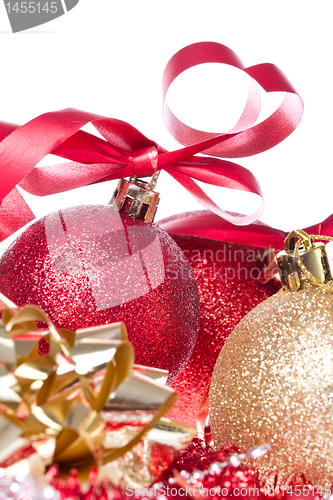 Image of christmas balls with ribbon and tinsel