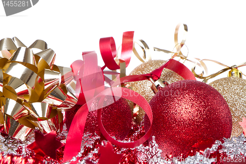 Image of christmas balls with ribbon and tinsel