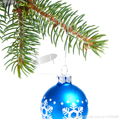 Image of ball hanging from spruce christmas tree