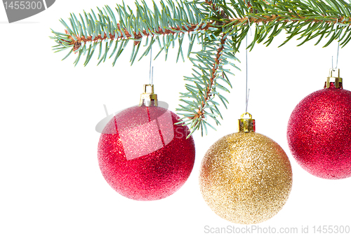 Image of red christmas ball hanging from tree