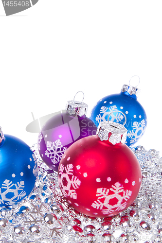 Image of christmas balls with tinsel