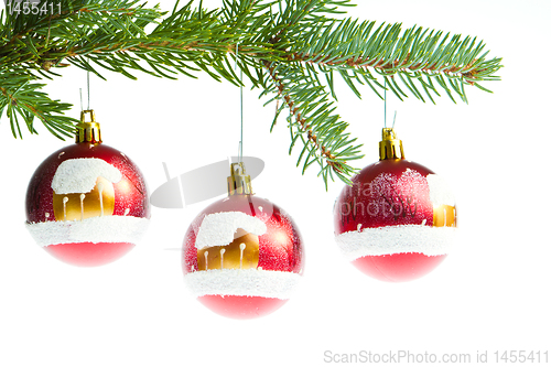 Image of red christmas ball on branch