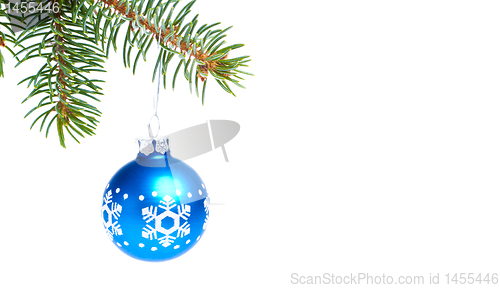 Image of ball hanging from spruce christmas tree