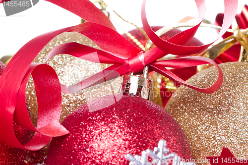 Image of christmas balls with ribbon and tinsel