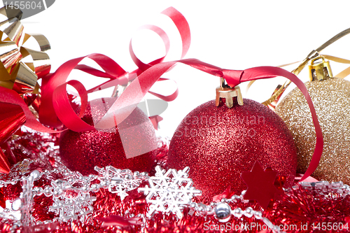 Image of christmas balls with ribbon and tinsel