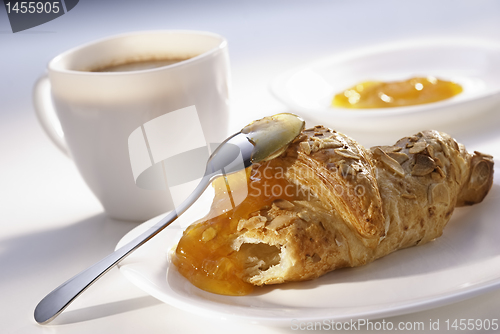 Image of almonds croissant and apricot jam