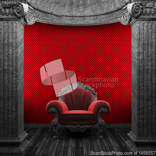 Image of stone columns, chair and wallpaper