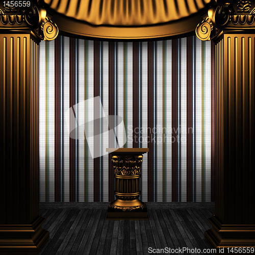 Image of bronze columns, pedestal and tile wall