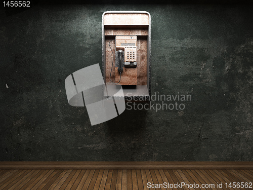 Image of old concrete wall and telephone booth
