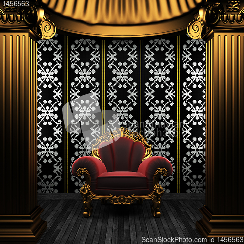 Image of bronze columns, chair and tile wall