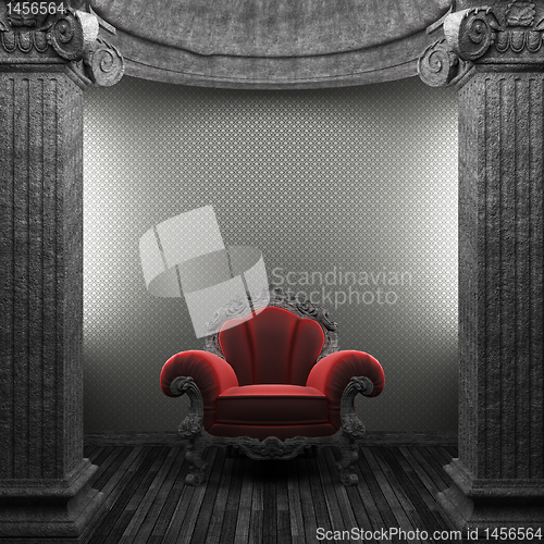 Image of stone columns, chair and wallpaper