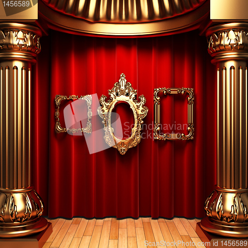 Image of red curtains, gold columns and frames