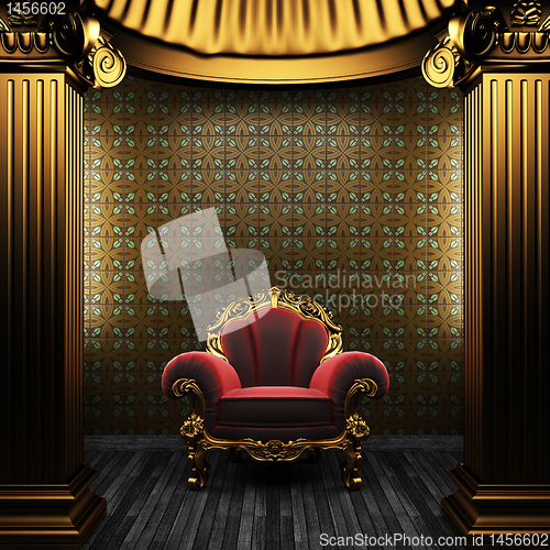 Image of bronze columns, chair and tile wall