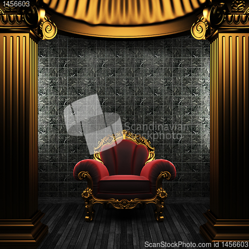 Image of bronze columns, chair and tile wall