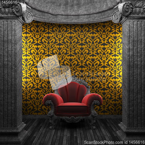 Image of stone columns, chair and tile wall